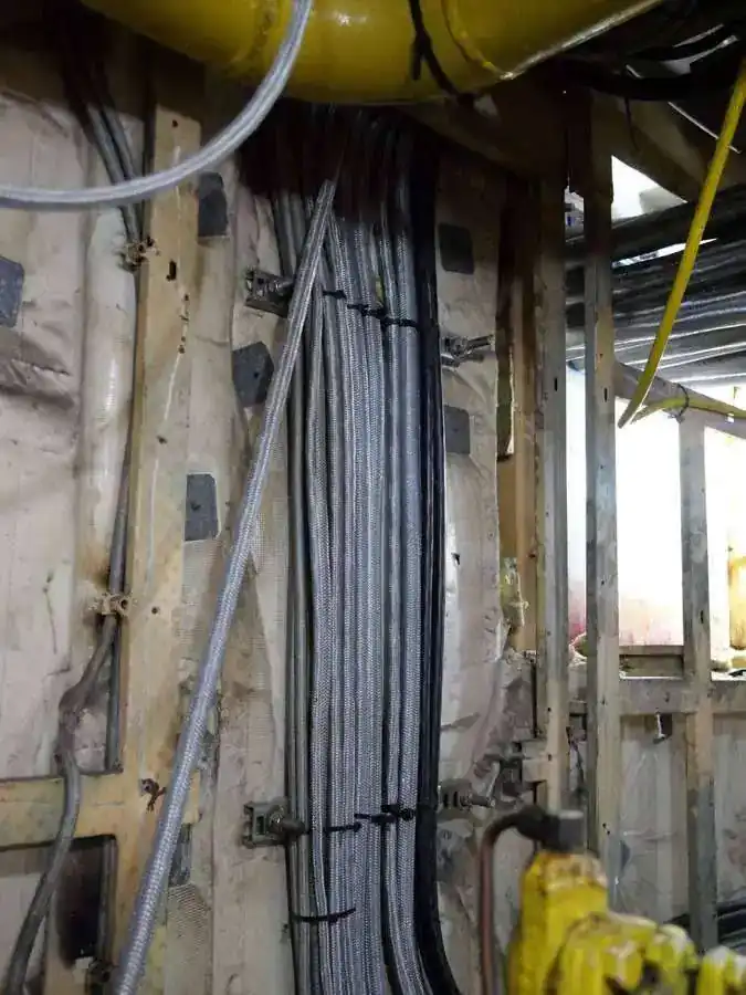 Electrical cable routing through vessel structure