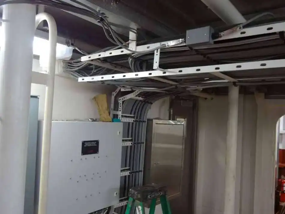 Data acquisition system panel with routed cable trays