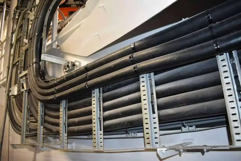 Heavy electrical cable bend and structural support installation