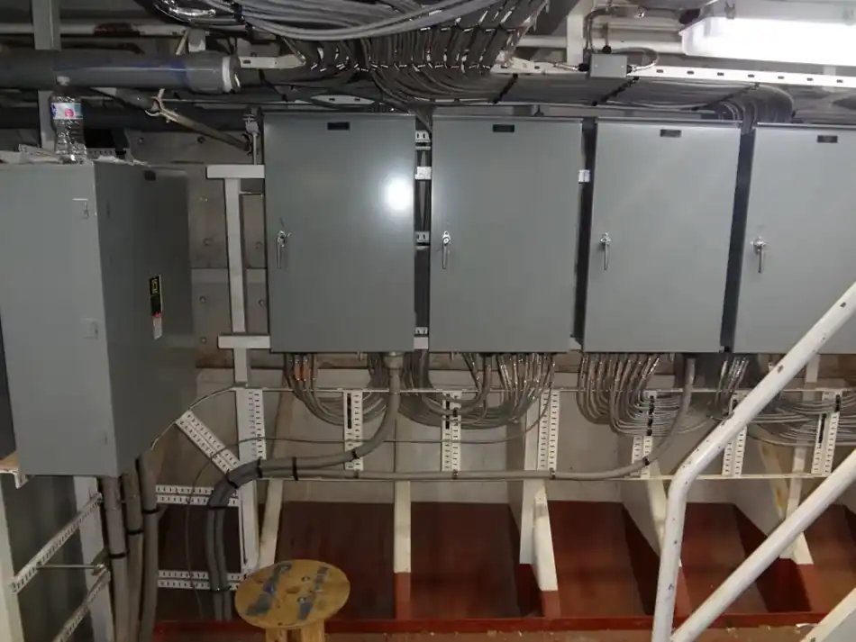 Electrical enclosures, conduit and cable routing aboard a vessel