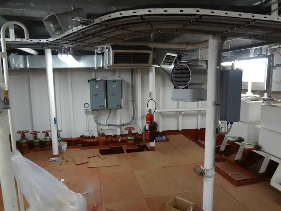 Vessel machinery space with electrical controls, ducting and cable routing