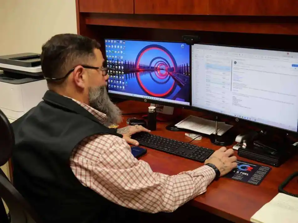 Coastwide project support and purchasing work at an office workstation